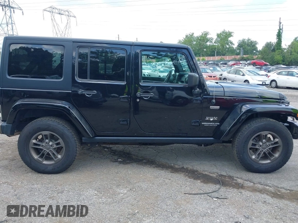 2016 Jeep Wrangler Unlimited Sahara z VIN 1C4HJWEG3GL343340, wystawiony jako IAAI lot #42683859 z przebiegiem 92 878 mil mil oraz . Historia ofert i sprzedaży dostępna na DreamBid. Obrazek 14.