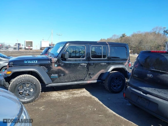 2023 Jeep Wrangler 4xe with VIN 1C4JJXN67PW621024, listed as a IAAI auction lot 41411389 with 21,306 mi miles. Bid and sale history available at carsss.com. Image 14.