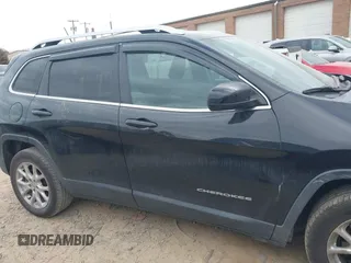 2014 Jeep Cherokee Latitude z VIN 1C4PJLCBXEW172745, wystawiony jako IAAI lot #41718415 z przebiegiem 115 777 mil mil oraz . Historia ofert i sprzedaży dostępna na DreamBid. Obrazek 13.