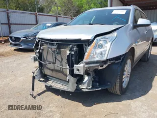 2015 Cadillac SRX Luxury Collection with VIN 3GYFNBE38FS576165, listed as a IAAI auction lot 41974066 with 95,832 mi miles. Bid and sale history available at carsss.com. Image 20.