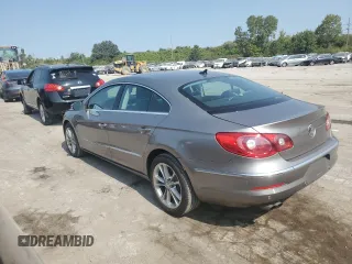 2009 Volkswagen CC Luxury with VIN WVWHL73C19E514531, listed as a Copart auction lot 71124304 with 120,483 mi miles and Salvage Title. Bid and sale history available at DreamBid. Image 2.