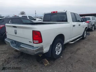 2009 Dodge Ram 1500 SLT with VIN 1D3HB18PX9S700623, listed as a IAAI auction lot 41617857 with 231,055 mi miles. Bid and sale history available at carsss.com. Image 4.