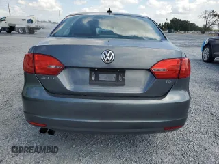 2014 Volkswagen Jetta TDI w/Premium with VIN 3VWLL7AJ7EM436916, listed as a Copart auction lot 58238385 with 103,265 mi miles and Salvage title. Bid and sale history available at DreamBid. Image 6.