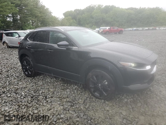 2024 Mazda CX-30 S Premium with VIN 3MVDMBDM5RM687192, listed as a Copart auction lot 58716355 with 22,307 mi miles and Salvage title. Bid and sale history available at DreamBid. Image 4.