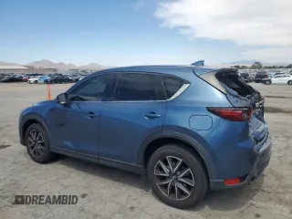 2018 Mazda CX-5 Grand Touring with VIN JM3KFBDM3J0323211, listed as a Copart auction lot 61166735 with Not provided miles and Salvage title. Bid and sale history available at DreamBid. Image 2.