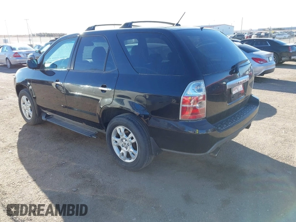 2004 Acura MDX Touring Pkg w/Navigation with VIN 2HNYD18804H525580, listed as a IAAI auction lot 41815839 with 281,295 mi miles. Bid and sale history available at carsss.com. Image 3.