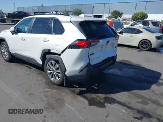 2023 Toyota RAV4 XLE Premium with VIN 2T3C1RFV7PW299428, listed as a IAAI auction lot 42527306 with 9,853 mi miles and . Bid and sale history available at DreamBid. Image 3.