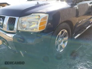 2007 Nissan Titan SE z VIN 1N6BA07B77N214250, wystawiony jako IAAI lot #42142029 z przebiegiem 184 575 mil mil oraz . Historia ofert i sprzedaży dostępna na DreamBid. Obrazek 6.
