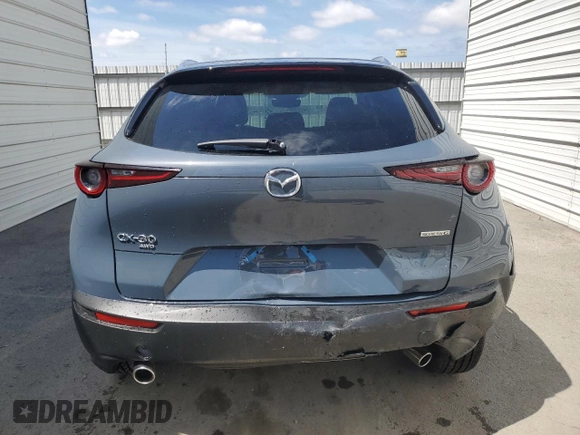 2025 Mazda CX-30 S Carbon Edition z VIN 3MVDMBCM2SM799150, wystawiony jako Copart lot #50815975 z przebiegiem 223 mil mil oraz Szkoda całkowita • Salvage title. Historia ofert i sprzedaży dostępna na DreamBid. Obrazek 6.
