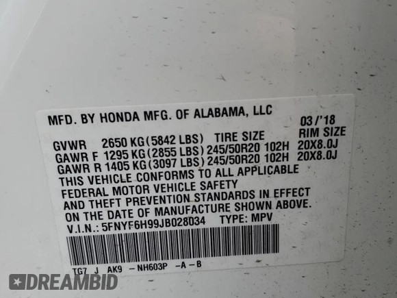 2018 Honda Pilot Touring z VIN 5FNYF6H99JB028034, wystawiony jako Copart lot #45143085 z przebiegiem 70 060 mil mil oraz Szkoda całkowita • Salvage title. Historia ofert i sprzedaży dostępna na DreamBid. Obrazek 13.
