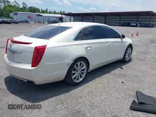 2013 Cadillac XTS Luxury with VIN 2G61P5S38D9160016, listed as a IAAI auction lot 42192602 with 134,879 mi miles and . Bid and sale history available at DreamBid. Image 4.