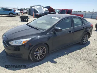 2018 Ford Focus SE с VIN 1FADP3FE8JL205699, выставлен на аукционе Copart как лот 63300795 с пробегом 128 877 миль миль и Чистый • Clean title. История ставок и продаж доступна на DreamBid. Изображение 1.