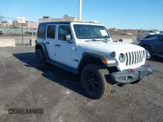 2020 Jeep Wrangler Unlimited Sahara High Altitude with VIN 1C4HJXEGXLW118444, listed as a IAAI auction lot 42064392 with 47,434 mi miles and . Bid and sale history available at DreamBid. Image 1.