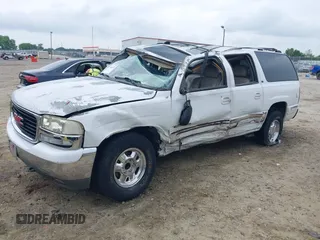 2002 GMC Yukon XL SLT z VIN 1GKEC16Z42J136352, wystawiony jako IAAI lot #42300333 z przebiegiem 212 362 mil mil oraz . Historia ofert i sprzedaży dostępna na DreamBid. Obrazek 2.