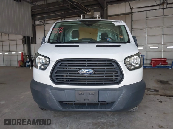 2016 Ford Transit Cargo z VIN 1FTYR1YM7GKB55438, wystawiony jako IAAI lot #42497571 z przebiegiem 66 612 mil mil oraz . Historia ofert i sprzedaży dostępna na DreamBid. Obrazek 13.