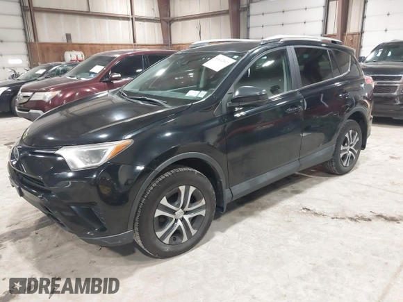 2017 Toyota RAV4 LE with VIN 2T3BFREV8HW571887, listed as a IAAI auction lot 41612815 with 100,742 mi miles and . Bid and sale history available at DreamBid. Image 18.