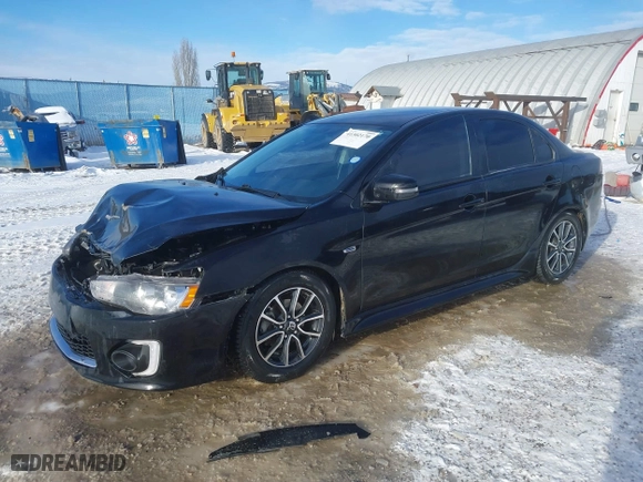 2017 Mitsubishi Lancer ES with VIN JA32U2FU2HU009837, listed as a IAAI auction lot 41302170 with 99,727 mi miles. Bid and sale history available at carsss.com. Image 17.