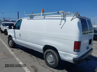 2006 Ford Econoline Cargo with VIN 1FTNE24L66HA64111, listed as a IAAI auction lot 41947445 with 205,025 mi miles and . Bid and sale history available at DreamBid. Image 3.