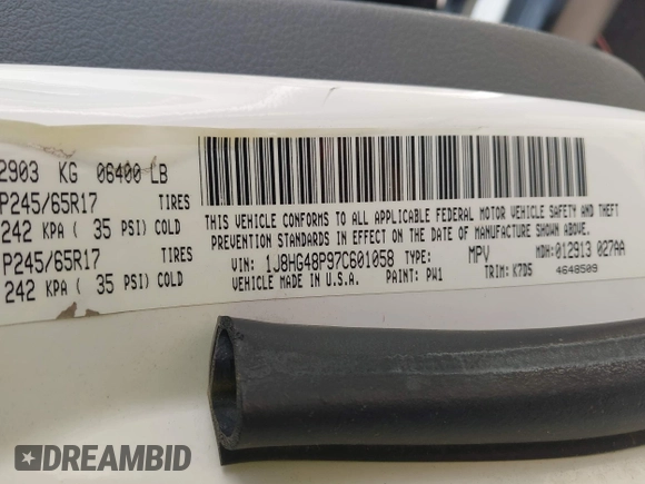 2007 Jeep Commander Sport with VIN 1J8HG48P97C601058, listed as a IAAI auction lot 42489447 with 200,103 mi miles and . Bid and sale history available at DreamBid. Image 9.