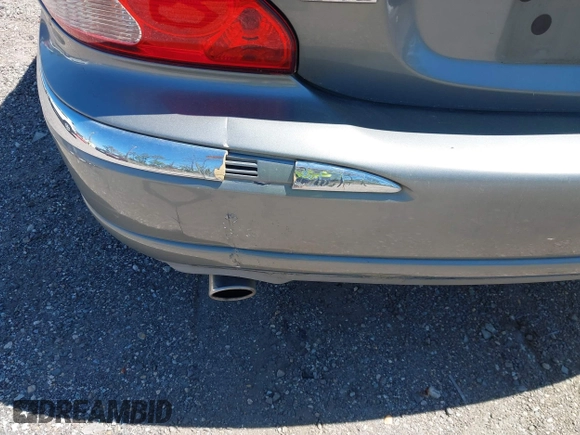 2004 Jaguar X-Type with VIN SAJEA51C04WD73023, listed as a IAAI auction lot 41874488 with 199,333 mi miles and . Bid and sale history available at DreamBid. Image 6.