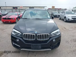 2014 BMW X5 xDrive35d with VIN 5UXKS4C56E0J93861, listed as a IAAI auction lot 41906775 with 149,263 mi miles. Bid and sale history available at carsss.com. Image 12.