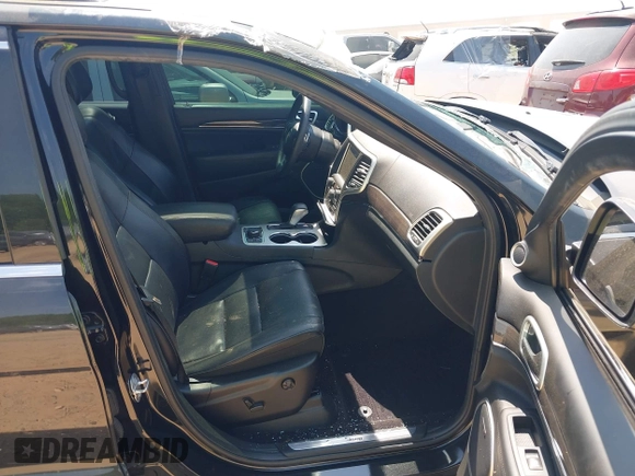 2016 Jeep Grand Cherokee Overland with VIN 1C4RJFCG5GC408390, listed as a IAAI auction lot 42140038 with 140,507 mi miles and . Bid and sale history available at DreamBid. Image 5.