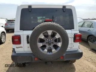 2018 Jeep Wrangler Unlimited Sahara z VIN 1C4HJXEG5JW165071, wystawiony jako Copart lot #59302865 z przebiegiem Nie podano mil oraz Czysty tytuł • Clean title. Historia ofert i sprzedaży dostępna na DreamBid. Obrazek 6.