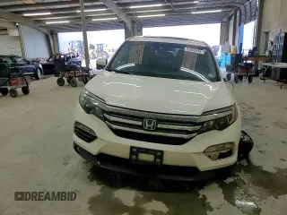 2018 Honda Pilot EX-L with VIN 5FNYF6H62JB043318, listed as a Copart auction lot 57853335 with 57,354 mi miles and Salvage title. Bid and sale history available at DreamBid. Image 15.