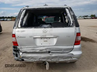 2002 Mercedes-Benz M-Class with VIN 4JGAB54E52A360097, listed as a Copart auction lot 72983104 with 199,445 mi miles and Salvage Title. Bid and sale history available at carsss.com. Image 6.