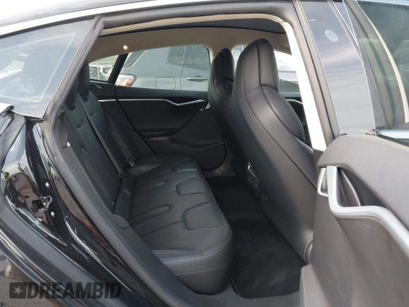 2017 Tesla Model S 100D with VIN 5YJSA1E28HF188981, listed as a IAAI auction lot 42010115 with 76,327 mi miles and . Bid and sale history available at DreamBid. Image 8.