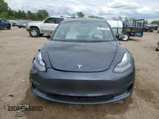 2023 Tesla Model 3 with VIN 5YJ3E1EA3PF672023, listed as a Copart auction lot 57571645 with 18,115 mi miles and Salvage title. Bid and sale history available at DreamBid. Image 5.