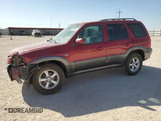 2005 Mazda Tribute i with VIN 4F2YZ02Z05KM52580, listed as a Copart auction lot 47320985 with 234,233 mi miles and Salvage Title. Bid and sale history available at carsss.com. Image 1.