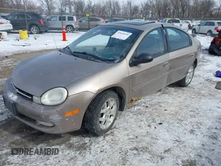 2000 Dodge Neon Highline z VIN 1B3ES46CXYD694730, wystawiony jako IAAI lot #41610249 z przebiegiem 110 930 mil mil oraz . Historia ofert i sprzedaży dostępna na DreamBid. Obrazek 17.