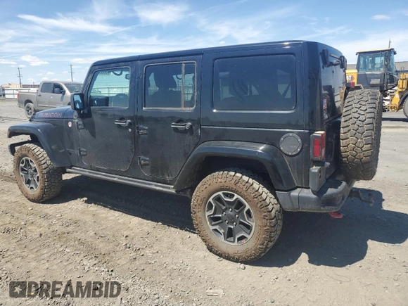 2014 Jeep Wrangler Unlimited Rubicon с VIN 1C4BJWFG7EL119344, выставлен на аукционе Copart как лот 65652265 с пробегом 150 934 миль миль и Списание • Salvage title. История ставок и продаж доступна на DreamBid. Изображение 2.