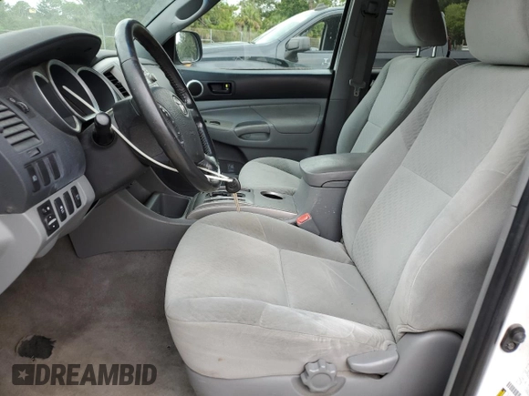 2010 Toyota Tacoma with VIN 3TMMU4FN1AM016612, listed as a Copart auction lot 59038495 with 127,448 mi miles and Clean title. Bid and sale history available at DreamBid. Image 7.