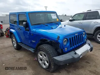 2015 Jeep Wrangler Sahara with VIN 1C4AJWBG9FL663959, listed as a IAAI auction lot 42133900 with 56,253 mi miles and . Bid and sale history available at DreamBid. Image 1.