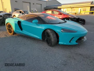 2023 McLaren GT z VIN SBM22GCA0PW002765, wystawiony jako Copart lot #78866364 z przebiegiem Nie podano mil oraz Szkody całkowita. Historia ofert i sprzedaży dostępna na DreamBid. Obrazek 4.