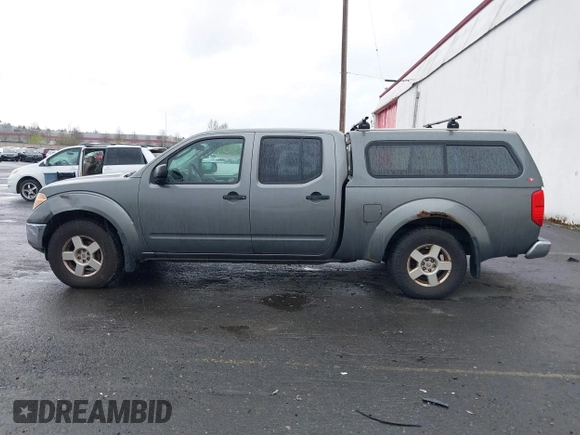 2007 Nissan Frontier SE with VIN 1N6AD09W17C408755, listed as a IAAI auction lot 41958819 with 218,530 mi miles. Bid and sale history available at carsss.com. Image 14.