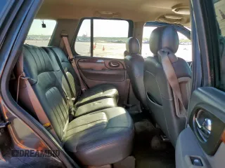 2003 GMC Envoy SLT z VIN 1GKDS13S332281271, wystawiony jako Copart lot #53685775 z przebiegiem 236 997 mil mil oraz Szkody całkowita. Historia ofert i sprzedaży dostępna na DreamBid. Obrazek 11.