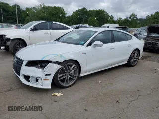 2015 Audi A7 Prestige with VIN WAU2GAFC5FN002704, listed as a Copart auction lot 62985105 with 47,412 mi miles and Salvage title. Bid and sale history available at DreamBid. Image 1.