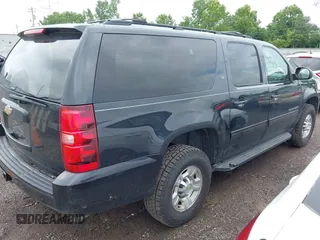 2011 Chevrolet Suburban with VIN 1GNWKMEG1BR374950, listed as a IAAI auction lot 42781182 with 304,690 mi miles and . Bid and sale history available at DreamBid. Image 4.