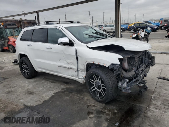 2015 Jeep Grand Cherokee Overland with VIN 1C4RJECG7FC872175, listed as a Copart auction lot 50653205 with 117,433 mi miles and Salvage title. Bid and sale history available at DreamBid. Image 4.