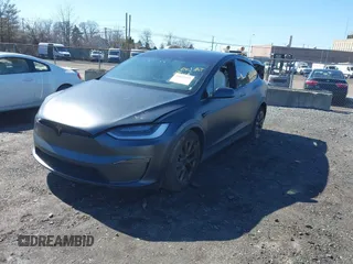 2022 Tesla Model X with VIN 7SAXCDE52NF345835, listed as a IAAI auction lot 41823522 with 24,401 mi miles and . Bid and sale history available at DreamBid. Image 16.