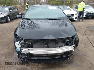 2023 Toyota Corolla SE with VIN 5YFS4MCE6PP160556, listed as a IAAI auction lot 41576922 with 55,318 mi miles and . Bid and sale history available at DreamBid. Image 12.