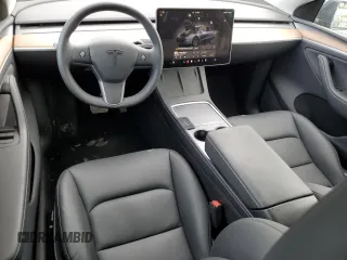 2024 Tesla Model Y with VIN 7SAYGDED1RA321691, listed as a Copart auction lot 52153945 with 7,544 mi miles and Salvage Title. Bid and sale history available at DreamBid. Image 8.