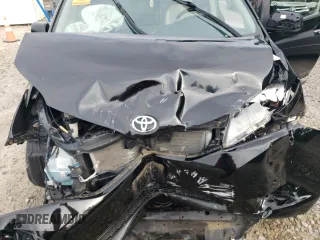 2011 Toyota Sienna XLE with VIN 5TDDK3DC8BS020059, listed as a Copart auction lot 62954985 with 219,974 mi miles and Salvage title. Bid and sale history available at DreamBid. Image 12.