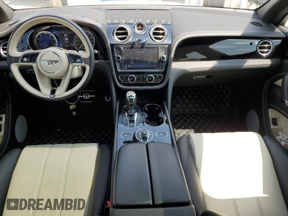 2019 Bentley Bentayga V8 z VIN SJAAM2ZV0KC026362, wystawiony jako Copart lot #54059393 z przebiegiem 31 530 mil mil oraz . Historia ofert i sprzedaży dostępna na DreamBid. Obrazek 8.