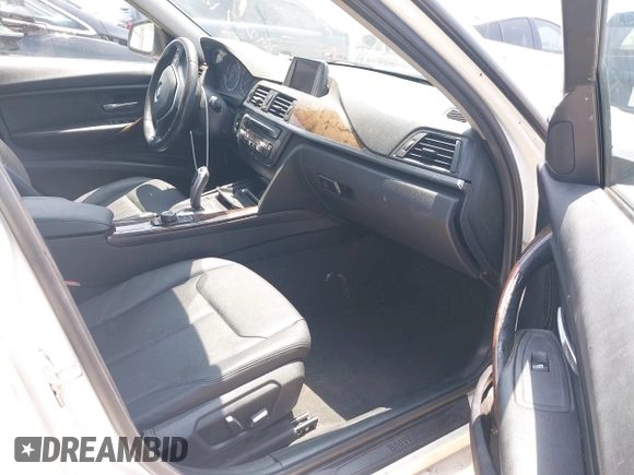 2014 BMW 3 Series 328i with VIN WBA3C1C59EK111396, listed as a IAAI auction lot 42471040 with 182,636 mi miles and . Bid and sale history available at DreamBid. Image 5.
