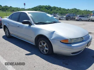 2004 Oldsmobile Alero GL1 z VIN 1G3NL52E04C197517, wystawiony jako IAAI lot #42315934 z przebiegiem Nie podano mil oraz . Historia ofert i sprzedaży dostępna na DreamBid. Obrazek 1.