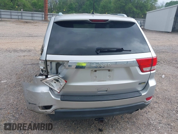 2011 Jeep Grand Cherokee Laredo with VIN 1J4RS4GGXBC564035, listed as a IAAI auction lot 41931861 with 242,291 mi miles and . Bid and sale history available at DreamBid. Image 13.